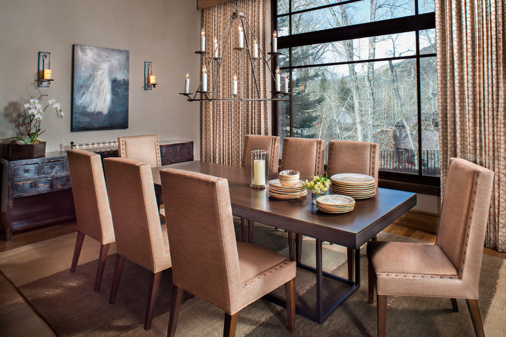 Transitional dining room in Boise with dark hardwood floors.