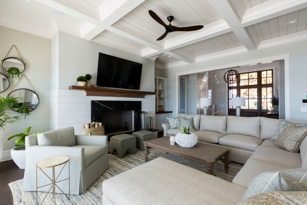 This is an example of a beach style family room in Charlotte.