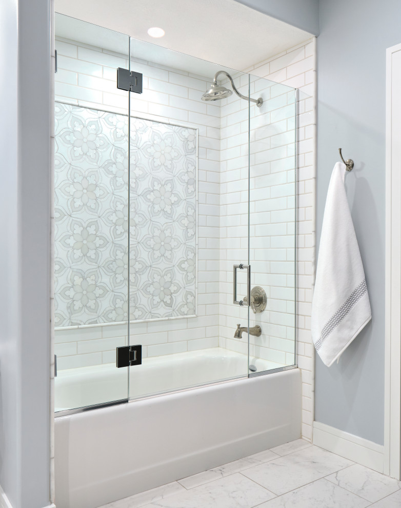 Example of a large transitional kids' white tile and mosaic tile porcelain tile, gray floor and single-sink bathroom design in Omaha with shaker cabinets, white cabinets, a two-piece toilet, blue walls, an undermount sink, quartz countertops, a hinged shower door, white countertops, a niche and a built-in vanity