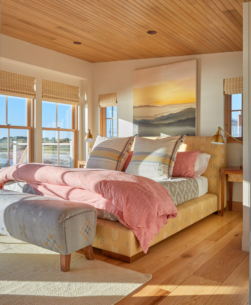 Example of a beach style home design design in Portland Maine