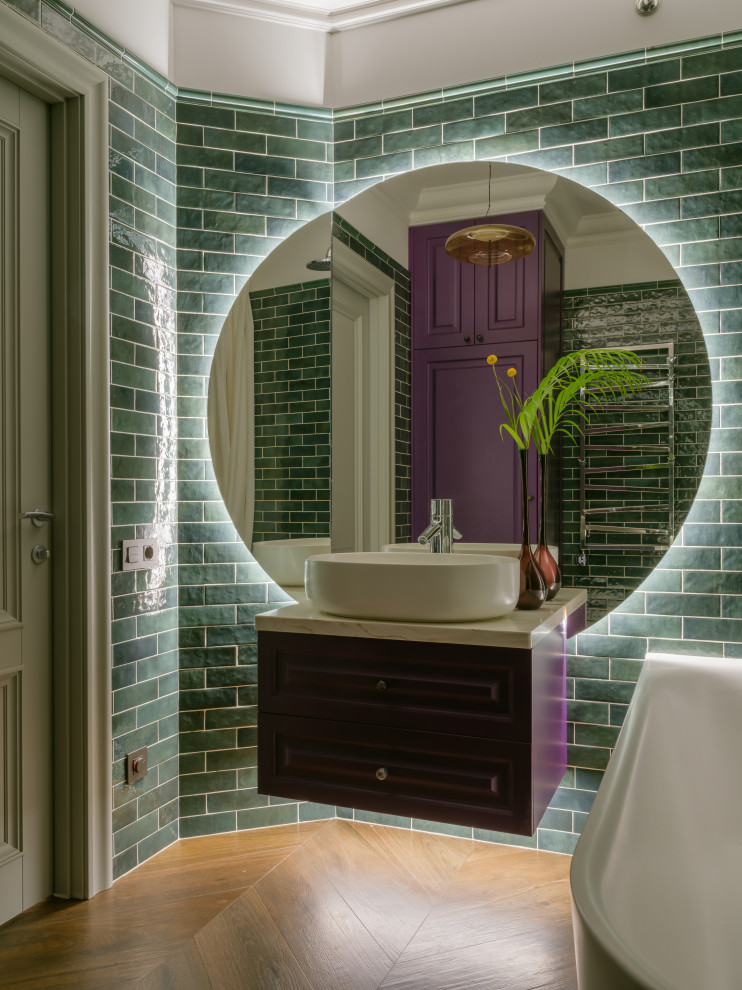 Mid-sized contemporary master bathroom in Moscow with raised-panel cabinets, purple cabinets, a freestanding tub, a shower/bathtub combo, a wall-mount toilet, green tile, subway tile, green walls, wood-look tile, a vessel sink, brown floor, a shower curtain, white benchtops, a single vanity, a floating vanity and brick walls.