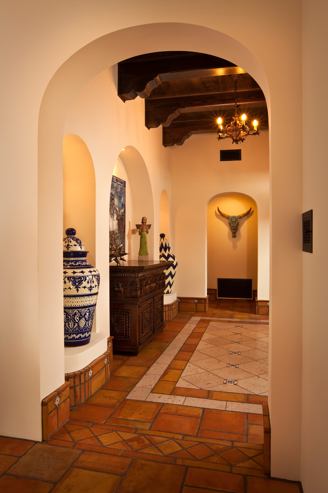 Entry hall in Phoenix with terra-cotta floors.