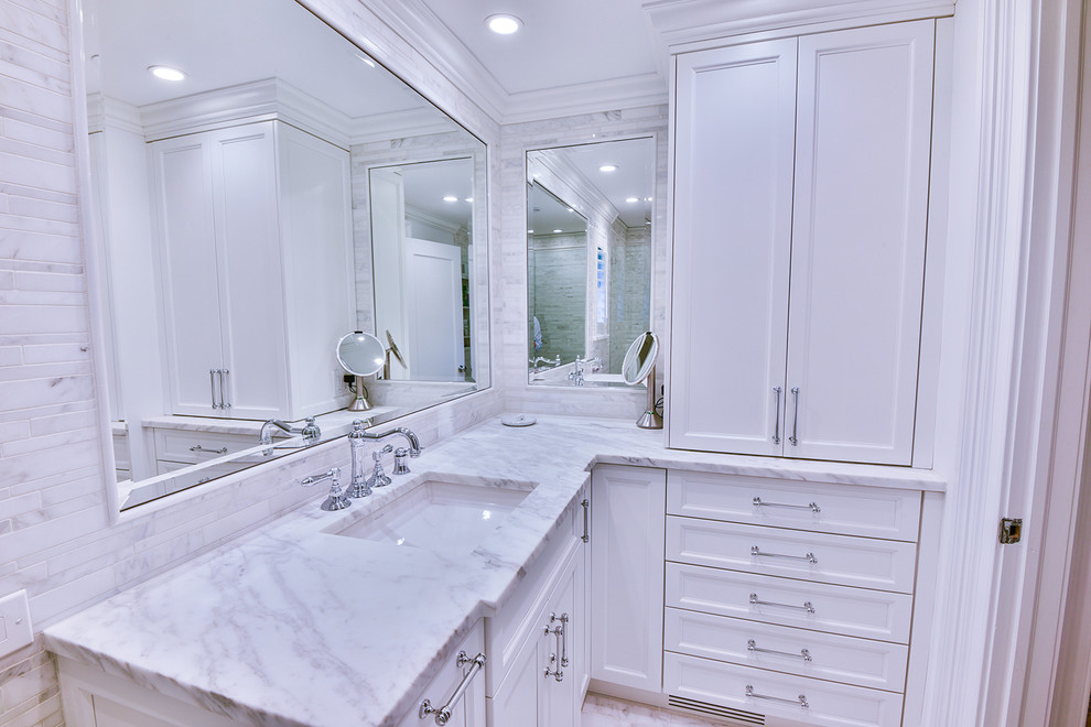 Design ideas for a contemporary master bathroom in Philadelphia with marble benchtops.