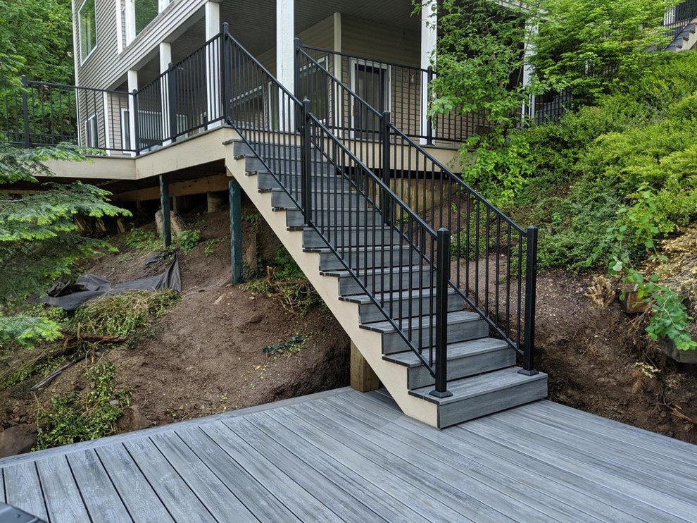 Inspiration for a mid-sized timeless backyard deck remodel in Seattle with no cover