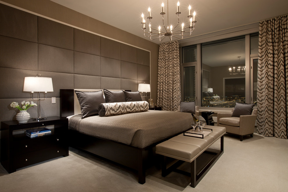 Contemporary bedroom in Chicago with brown walls and carpet.