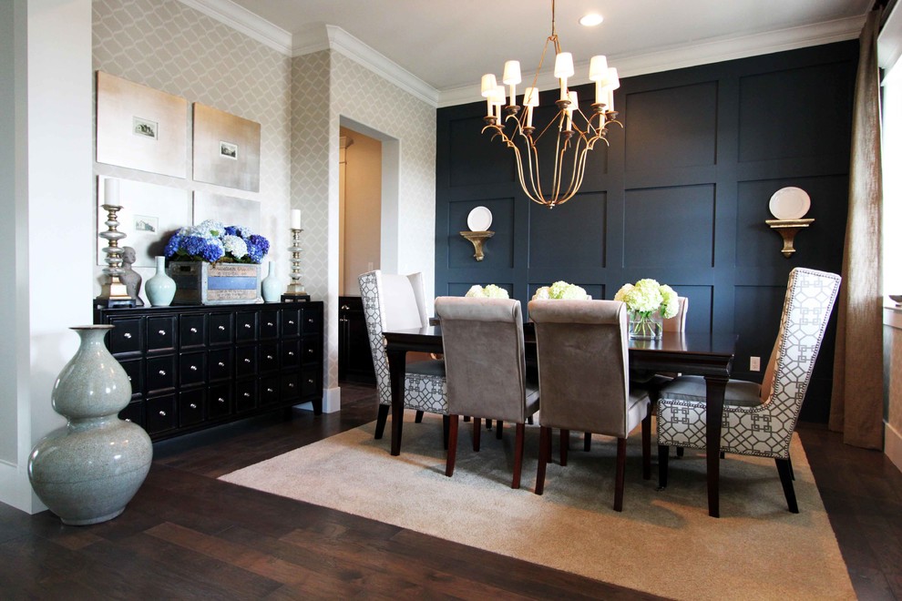 Inspiration for a large contemporary separate dining room in Orange County with black walls, dark hardwood floors and brown floor.