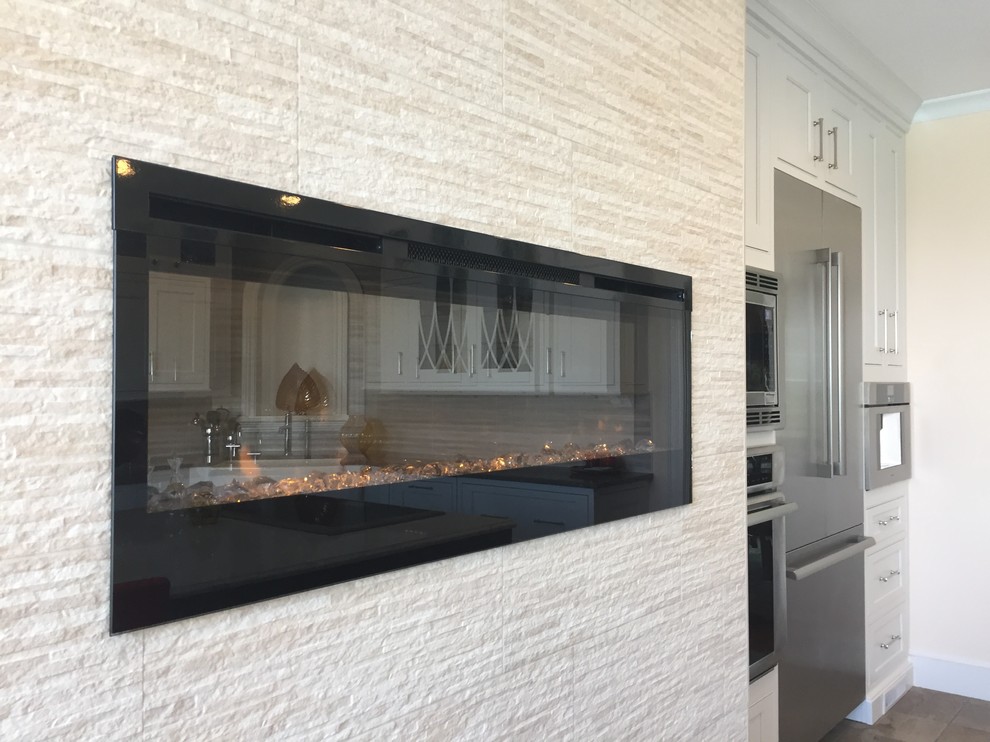 Large transitional ceramic tile and multicolored floor kitchen photo with a farmhouse sink, beaded inset cabinets, white cabinets, quartz countertops, metallic backsplash, ceramic backsplash, stainless steel appliances and an island