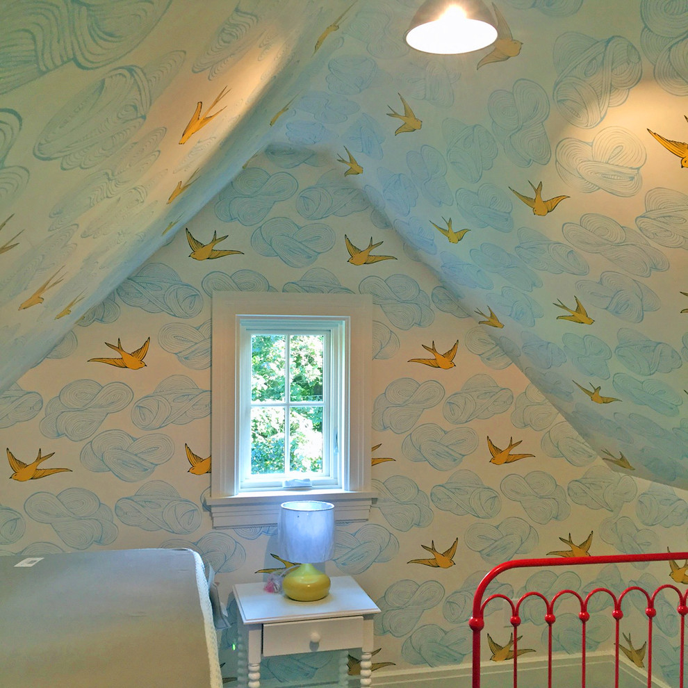 Photo of a small country gender-neutral nursery in New York with white walls.