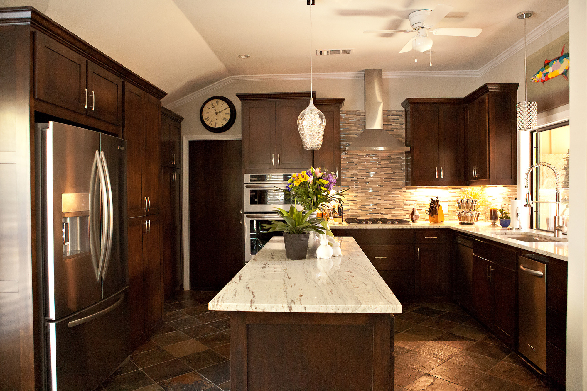 North Dallas Contemporary Kitchen remodel has marble countertops, custom island and pendant lighting, with mosaic glass tile backsplash, undermount sink, maple inset cabinets, and slate flooring. Phot