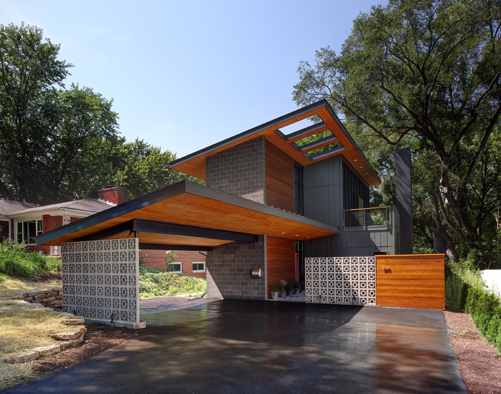 Inspiration for a contemporary attached two-car carport in Milwaukee.