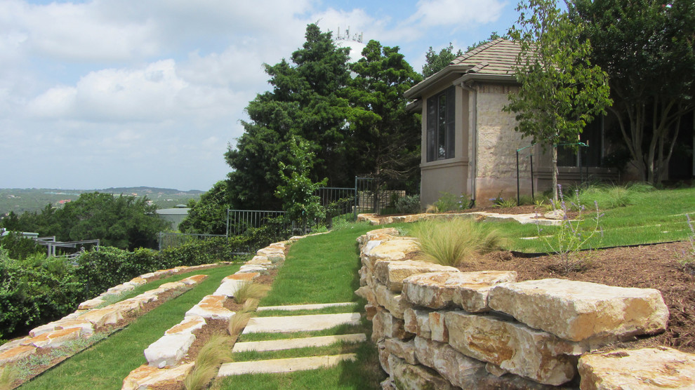 Design ideas for an expansive traditional exterior in Austin.