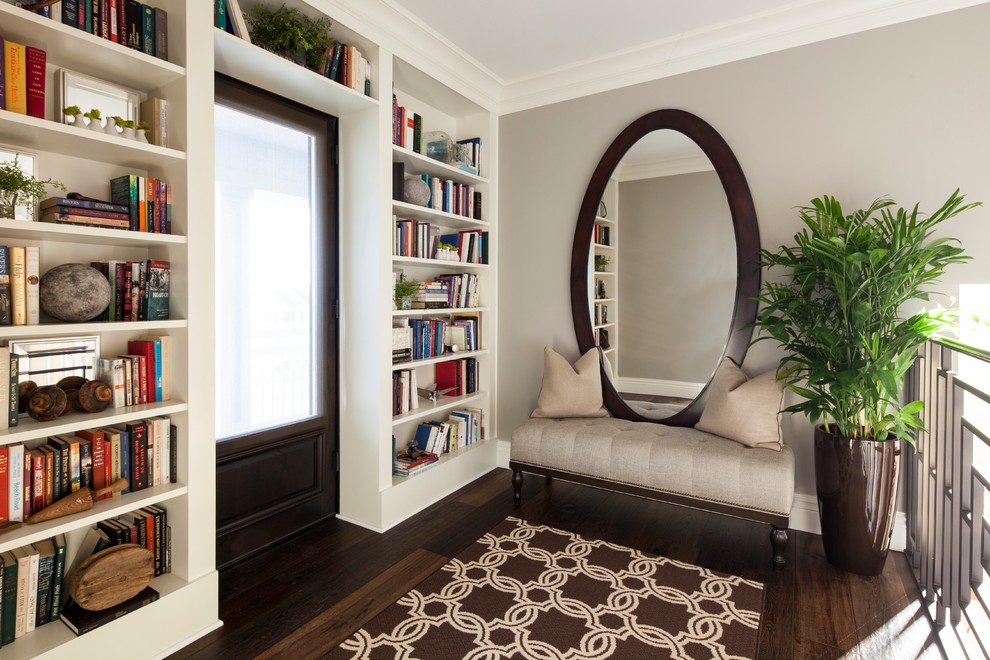 Built In Book storage Painted Built-in's - Example of a transitional hallway design in San Diego