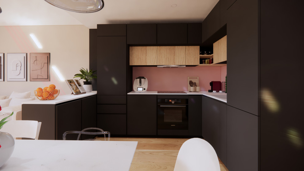 На фото: кухня-гостиная в стиле модернизм с одинарной мойкой, плоскими фасадами, черными фасадами, столешницей из ламината, розовым фартуком, полом из ламината, коричневым полом и белой столешницей без острова с