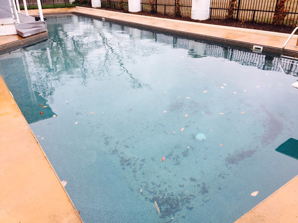 Mid-sized backyard rectangular natural pool fountain photo