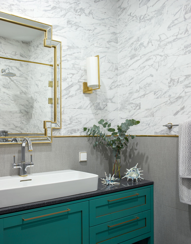 Inspiration for a transitional 3/4 bathroom in Moscow with recessed-panel cabinets, turquoise cabinets, a corner shower, a wall-mount toilet, gray tile, marble, grey walls, porcelain floors, a drop-in sink, solid surface benchtops, a shower curtain and black benchtops.