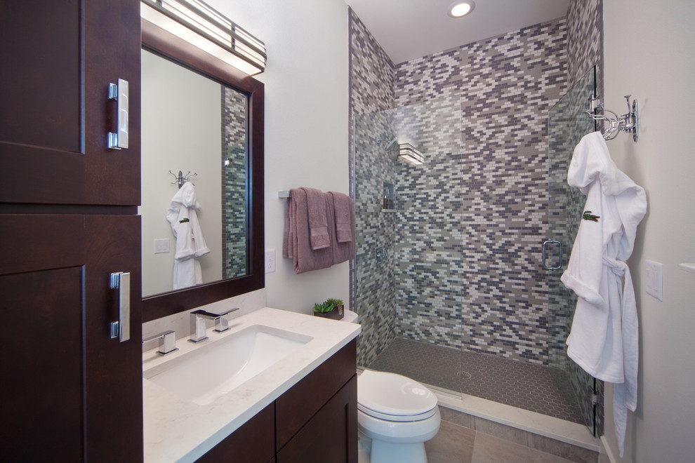 Design ideas for a mid-sized contemporary master bathroom in Orlando with an undermount sink, recessed-panel cabinets, white cabinets, a freestanding tub, a corner shower, white walls and porcelain floors.
