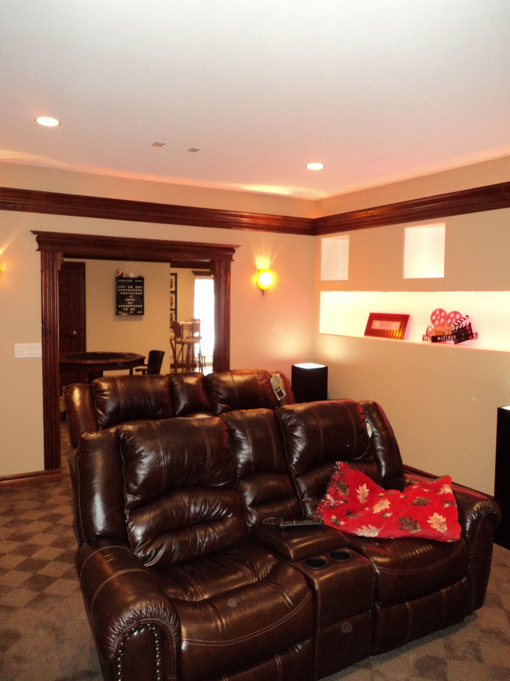 Example of a mountain style home theater design in Cedar Rapids