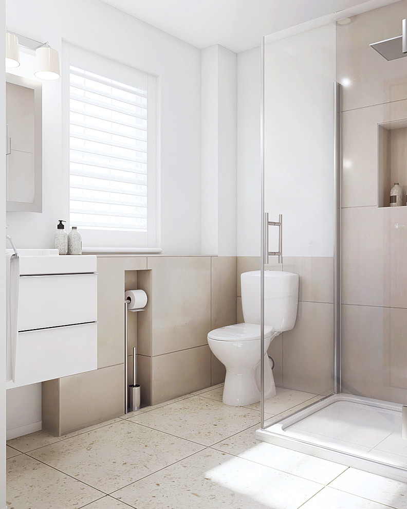 Mid-sized beach style kids bathroom in Cambridgeshire with flat-panel cabinets, white cabinets, a curbless shower, a one-piece toilet, brown tile, ceramic tile, white walls, ceramic floors, an integrated sink, tile benchtops, beige floor and a hinged shower door.