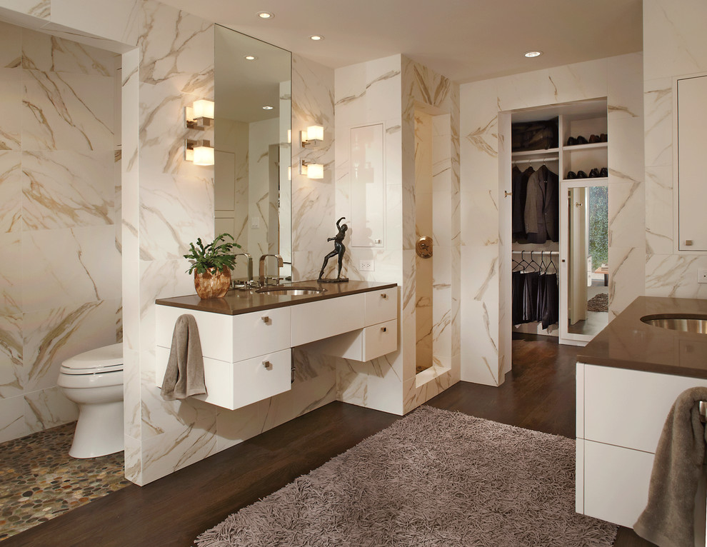 Inspiration for a contemporary bathroom in Dallas with flat-panel cabinets, white cabinets, white tile, stone tile, brown floor and brown benchtops.