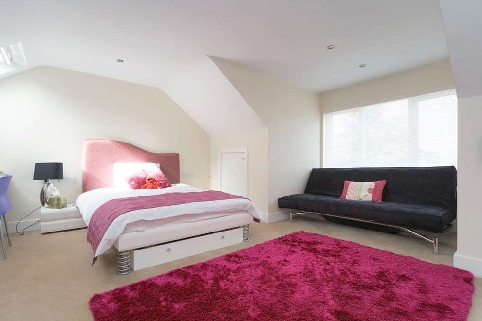 Mid-sized contemporary kids' room in Dublin with white walls and carpet for girls.