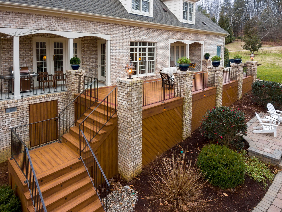 Deck - large transitional backyard deck idea with a fire pit and no cover