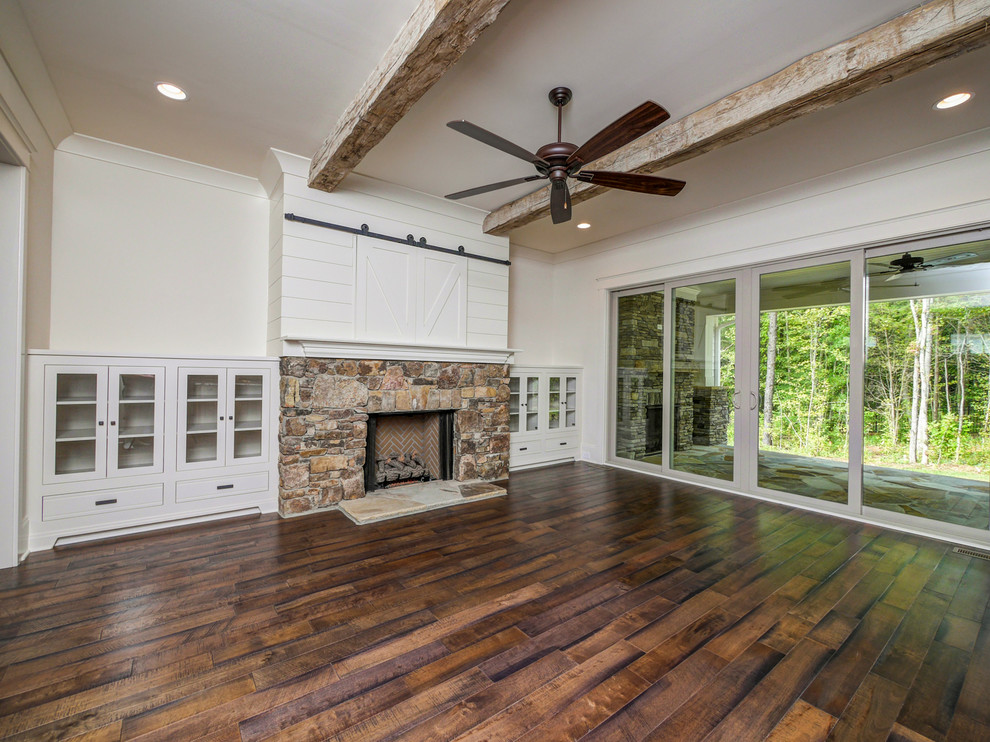 Photo of a country family room in Charlotte.