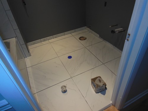 Can I use 12x24 floor tiles in a small bathroom - Also just in case it helps you, here is a pre-grout, pre toilet and vanity  picture