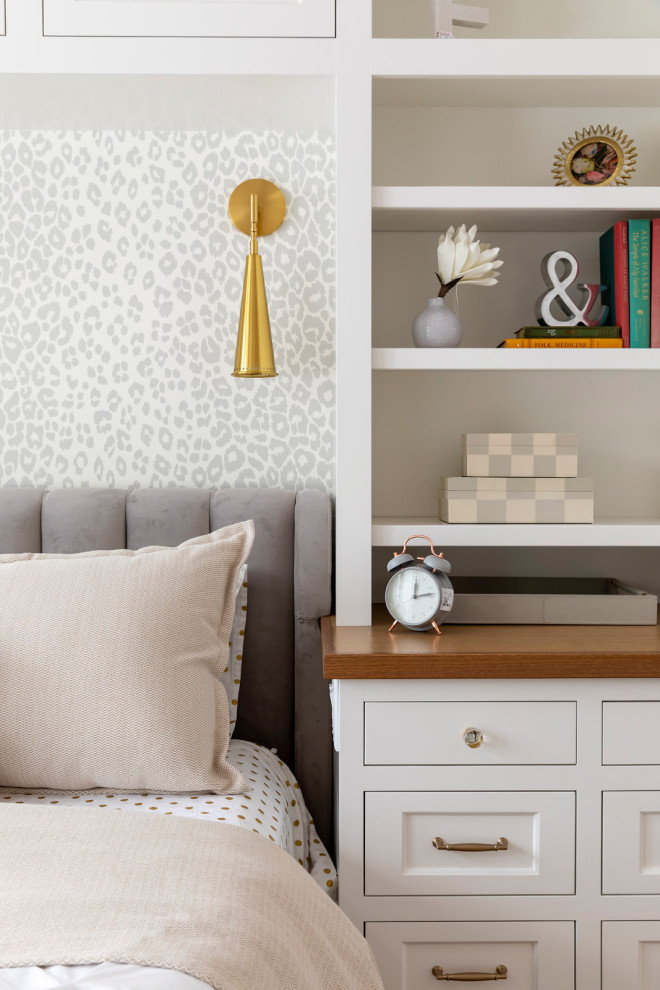 Grand Haven Custom Home - A place for rest and rejuvenation. Not too pink, the walls were painted a warm blush tone and matched with white custom cabinetry and gray accents. The brass finishes bring the warmth needed.