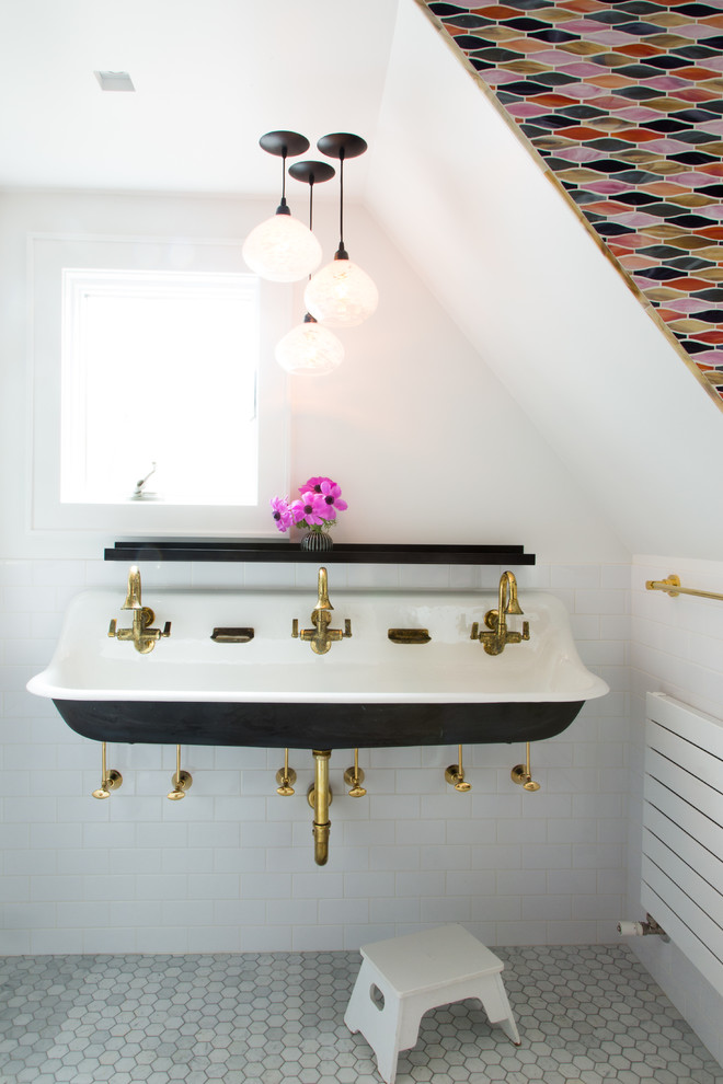Design ideas for a mid-sized traditional kids bathroom in New York with a wall-mount sink, a shower/bathtub combo, a one-piece toilet, multi-coloured tile, mosaic tile, white walls and marble floors.