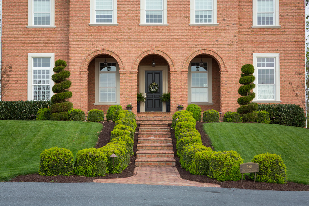 This is an example of a large traditional front door in Other with a single front door.