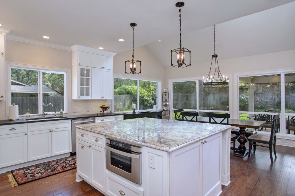 Transitional White Kitchen With Stacked Cabinets & Wood Hood ...