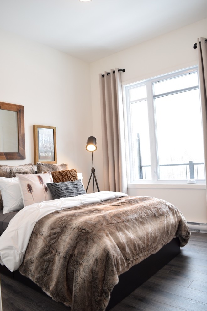 Mid-sized contemporary guest bedroom in Ottawa with white walls, dark hardwood floors and no fireplace.