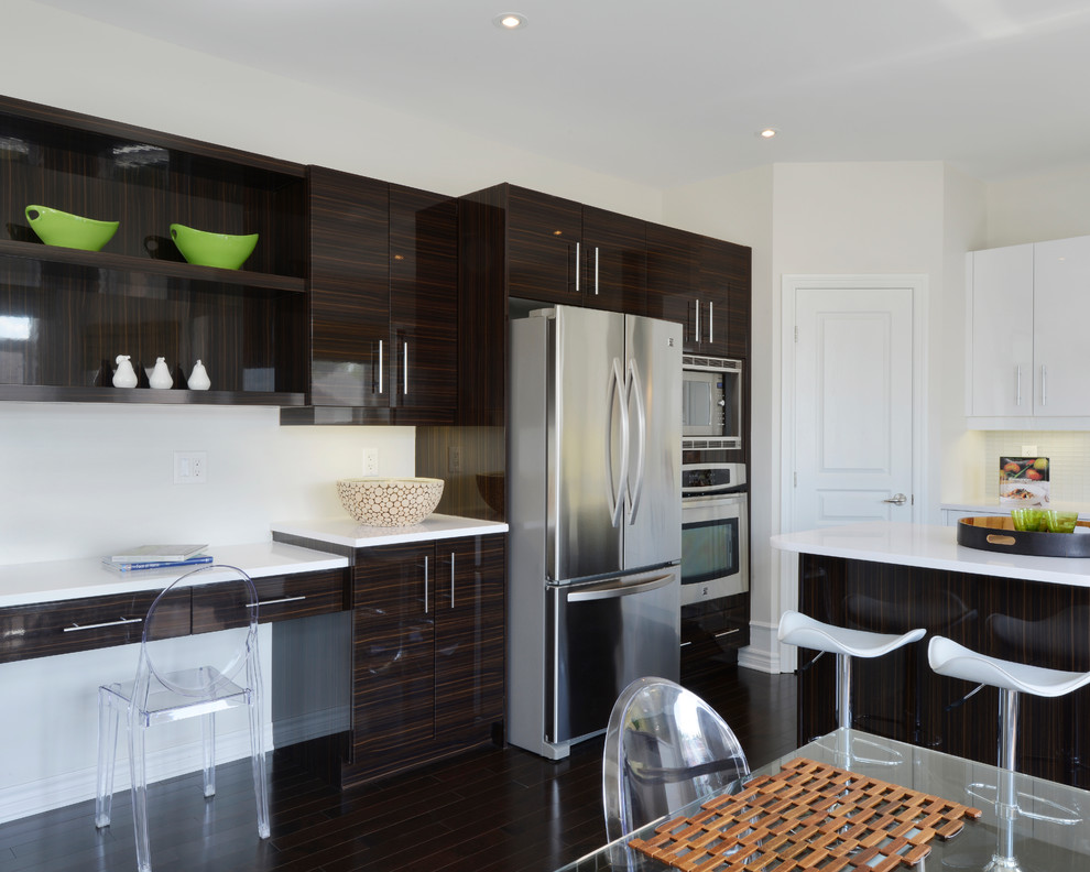 Contemporary kitchen in Ottawa with stainless steel appliances.