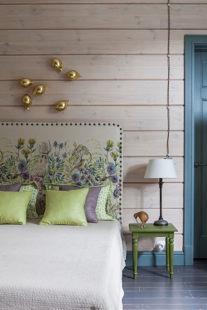 Photo of a traditional kids' bedroom for girls in Moscow with beige walls and dark hardwood floors.