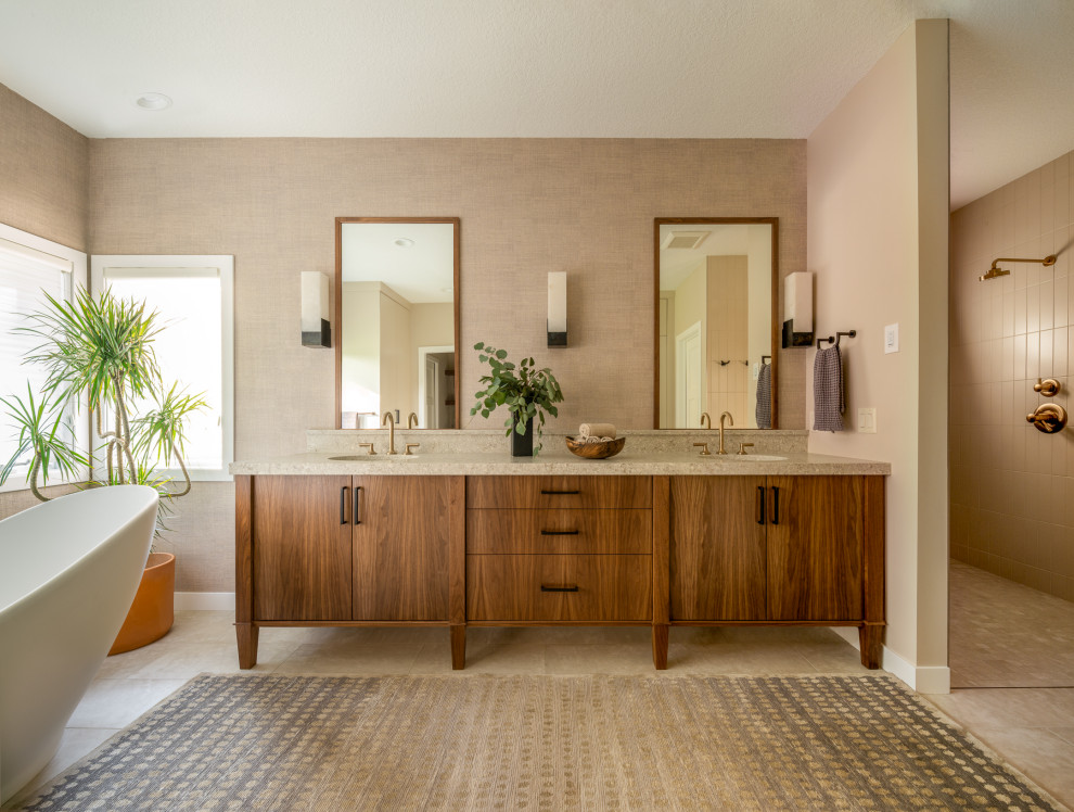 Inspiration for a mid-sized contemporary master wet room bathroom in Minneapolis with flat-panel cabinets, medium wood cabinets, a freestanding tub, marble floors, an undermount sink, granite benchtops, beige floor, an open shower, a double vanity, a built-in vanity and vaulted.
