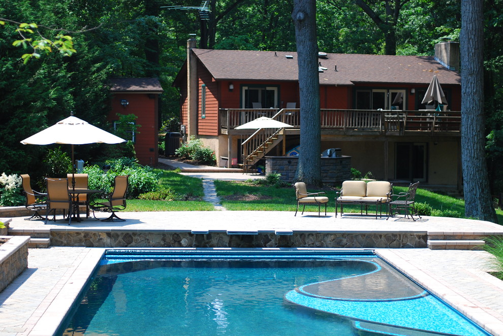 Pool - large transitional backyard stone and rectangular lap pool idea in Baltimore
