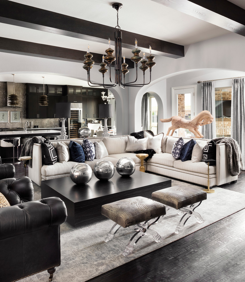 Photo of a transitional open concept living room in Dallas with grey walls and dark hardwood floors.