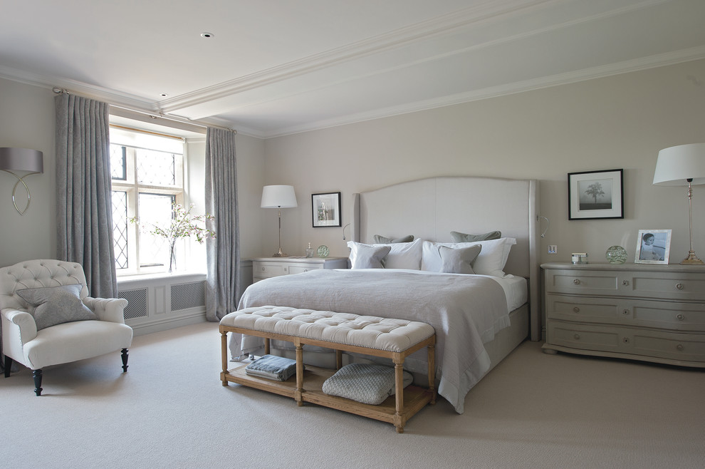 Design ideas for an expansive country master bedroom in Gloucestershire with carpet and grey walls.