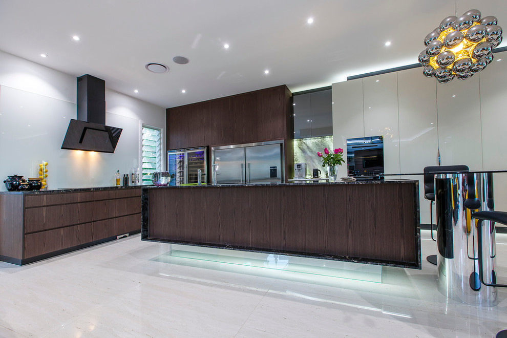 Design ideas for a large contemporary kitchen in Sunshine Coast with an undermount sink, dark wood cabinets, granite benchtops, glass sheet splashback and black appliances.