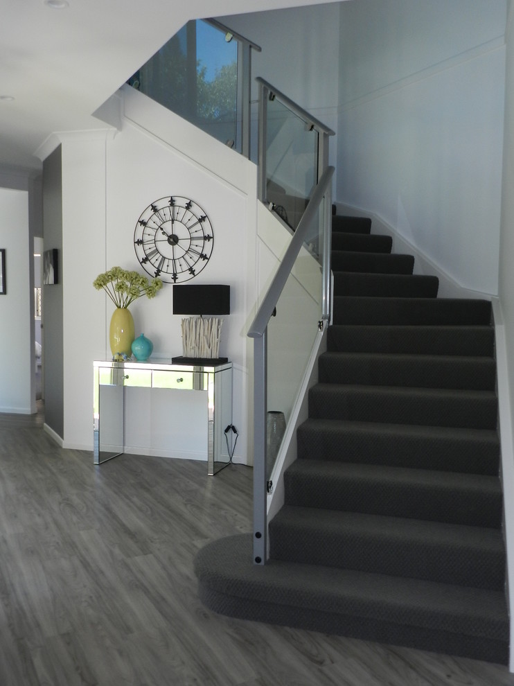 Design ideas for a transitional hallway in Sunshine Coast with white walls.