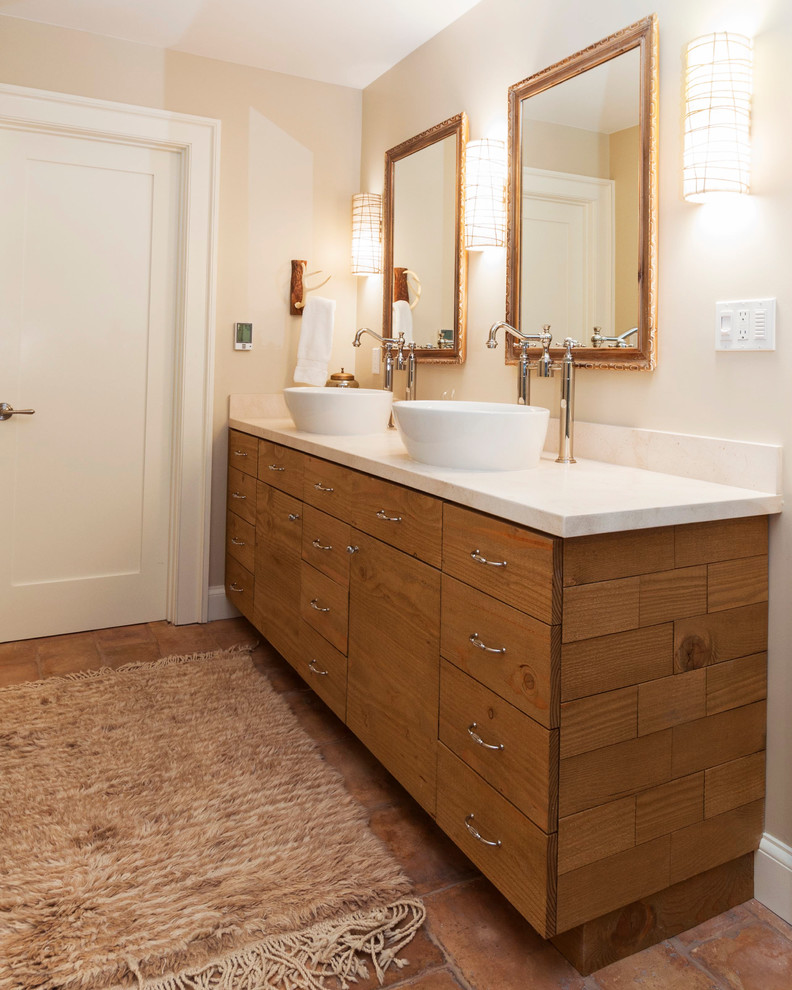 Inspiration for a transitional bathroom in San Francisco with a vessel sink, flat-panel cabinets and medium wood cabinets.