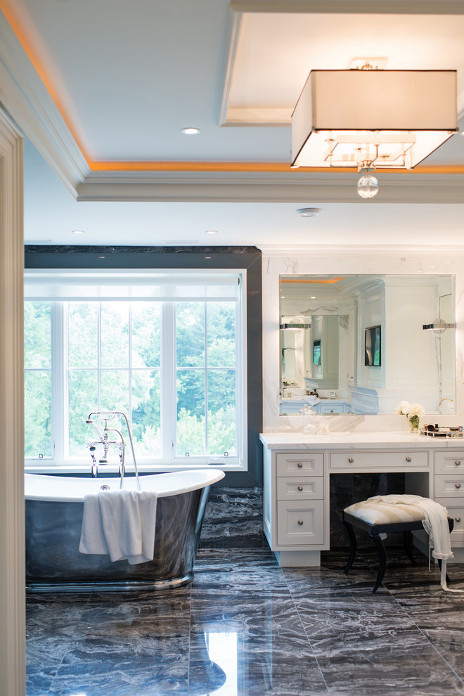 Transitional bathroom in Toronto with a freestanding tub.
