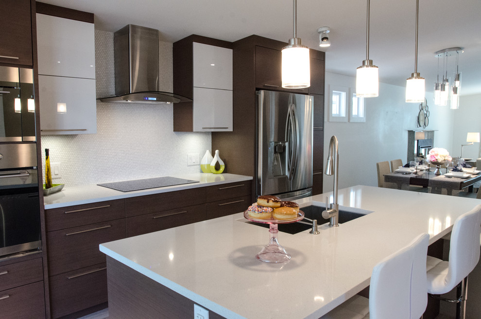 Eat-in kitchen - mid-sized contemporary u-shaped dark wood floor eat-in kitchen idea with a double-bowl sink, flat-panel cabinets, medium tone wood cabinets, quartzite countertops, white backsplash, mosaic tile backsplash, stainless steel appliances and an island