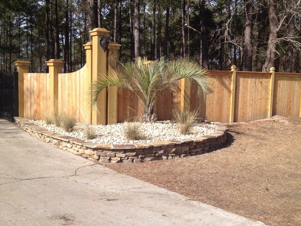 Inspiration for a full sun side yard driveway.
