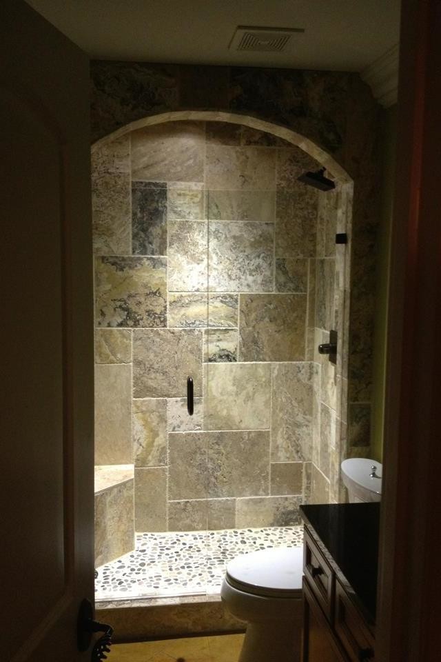 Alcove shower - mid-sized rustic master porcelain tile concrete floor alcove shower idea with granite countertops