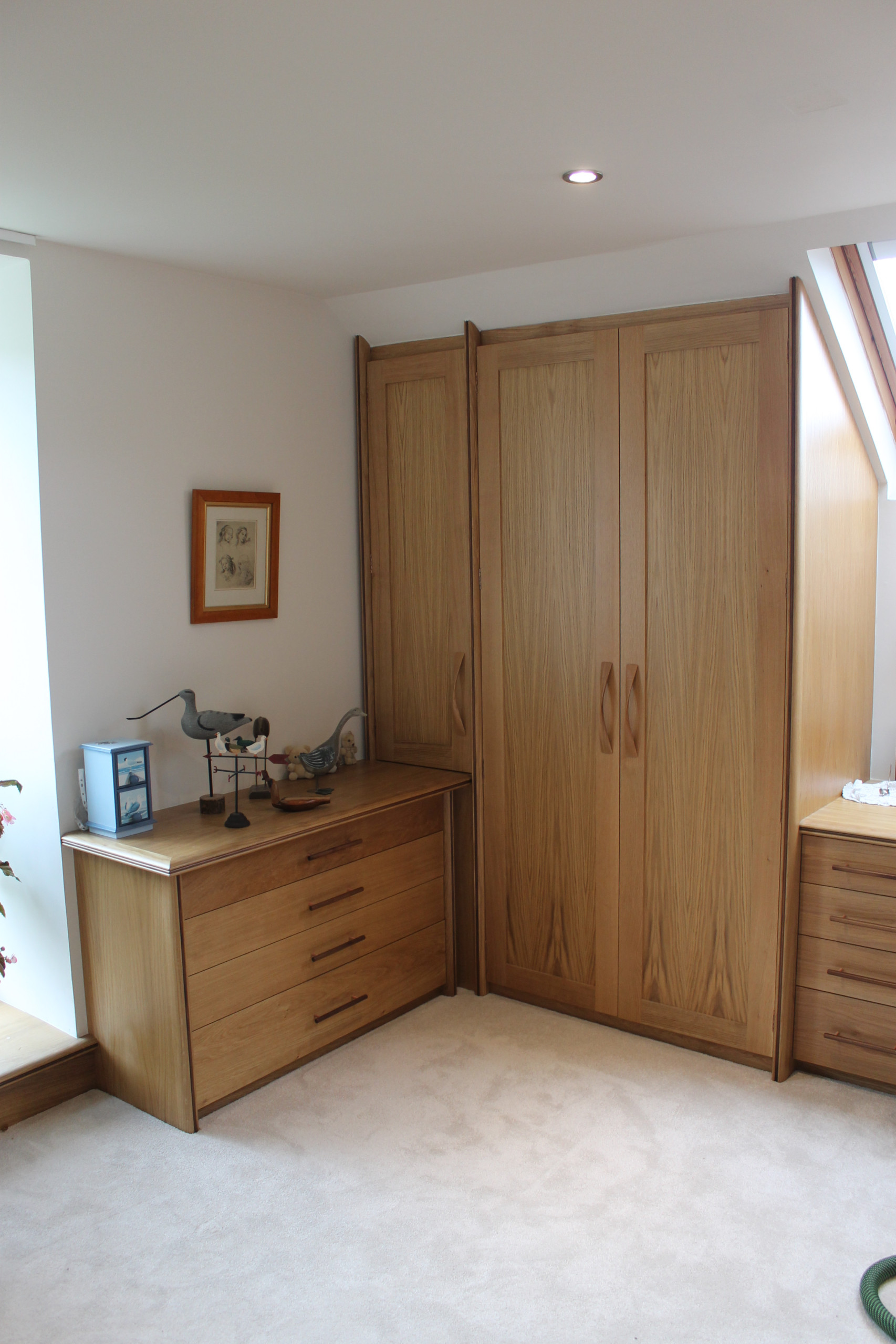 Oak and walnut fitted wardrobes