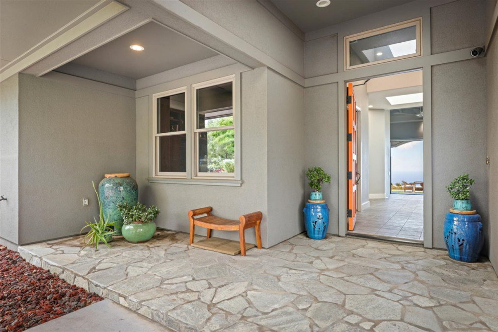 Design ideas for a large beach style entryway in Hawaii.