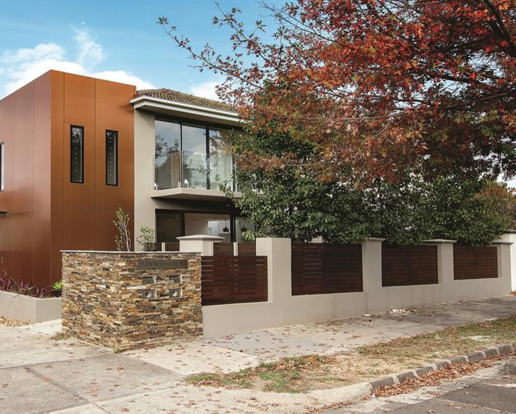 Photo of a large contemporary duplex exterior in Sydney.