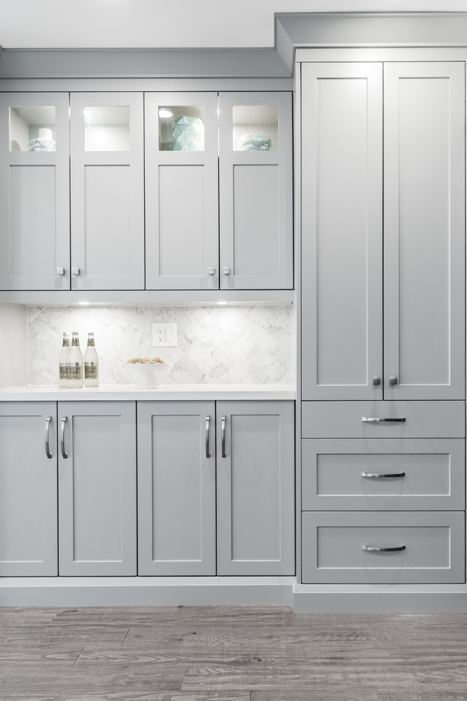 Example of a transitional kitchen design in Toronto
