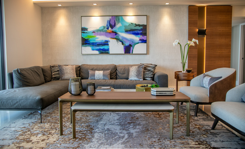 This is an example of a mid-sized modern formal open concept living room in Miami with white walls, porcelain floors, a wall-mounted tv and white floor.